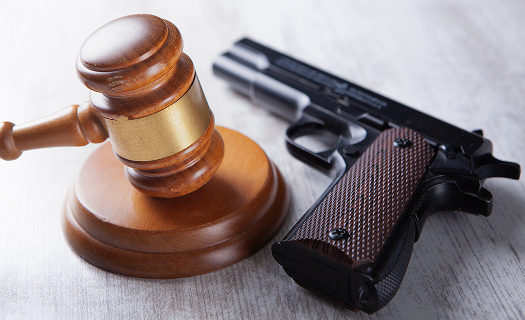 Black,Modern,Gun.,Weapon,Concept. Federal Firearm Restoration Application Preparation and Submission