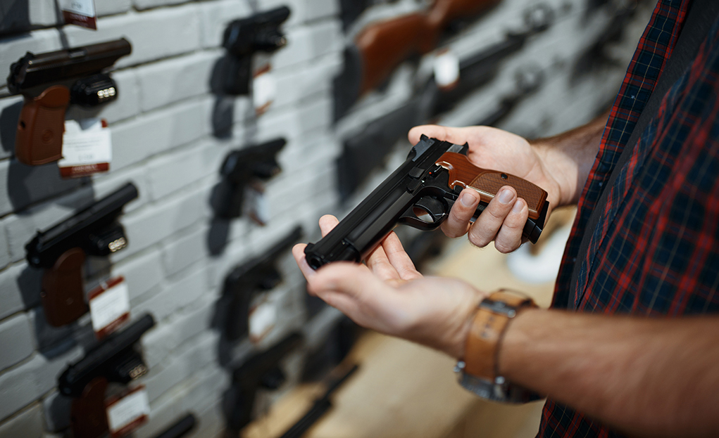 Black,Modern,Gun.,Weapon,Concept. State Firearm Restoration Application Preparation and Submission